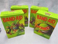 Lot - (4) New Band-Aid boxes (80 assorted sizes)
