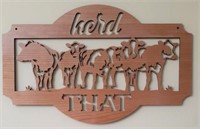 Wooden "Herd That" sign
