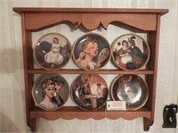 Set of (6) Norman Rockwell plates and plate rack