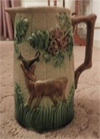Late 19th Century pottery handled pitcher with
