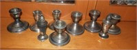 (3) Pairs of sterling silver weighted candlesticks
