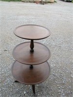 3 tiered round table- probably walnut  37"high