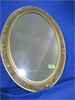 Oval mirror, gold frame  27 1/2 x 20"