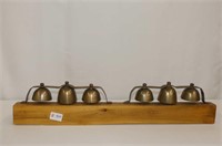 Pair of Sleigh Bells Mounted on Wood