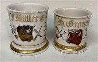 TWO BUTCHER DECORATED SHAVING MUGS