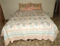 Double bed with pillow top mattress and pinwheel