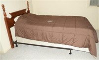 Cherry twin bed with never mattress and boxspring