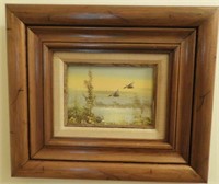 Framed oil on canvas of flying mallards in Pine