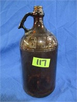 Brown JAVEX glass bottle
