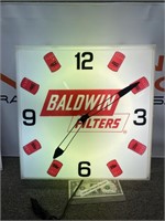 Vintage lighted Baldwin Filters advertising clock