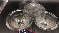 To clear stackable bowls, two clear plates and