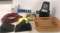 Garden tool hanger, chocks, extension cord, tie