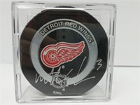 Signed #23 Mathieu Schneider Red Wings Puck