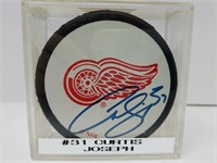 Signed #31 Curtis Joseph Red Wings Puck