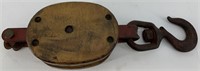 Vintage wood and steel block and tackle pulley in