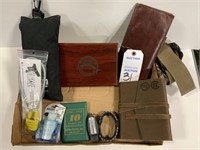Buddy bags, hunting journal, calculator and pen,