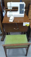 Kenmore Sewing machine, table, and chair.