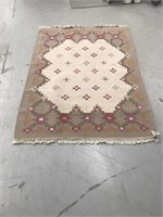 Wool hand woven area rug length:76 in width: 57