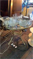 Glass table with glassware contents included