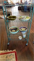 Lance Display Shelf and Pottery. Includes some