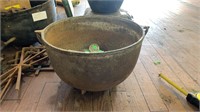 Cast iron pot by white with gate marks and