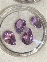 Amethyst colored faceted stones