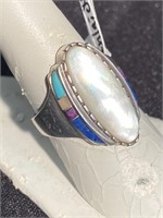 Mother of pearl plus inlaid stones in heavy