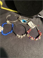 Five bracelets all in sterling silver and beads