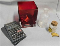 Red square vase - calculator - liquid paste bottle