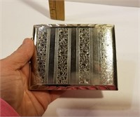 Vintage silver colored ornate cigarette case
