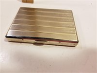 Vintage silver colored ornate cigarette case