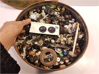 Antique tin of buttons and sewing notions