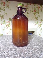 Amber Clorex bottle with handle