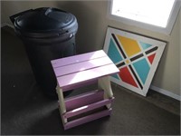 trash can, magazine rack, wood picture