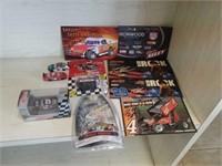 SEVERAL COLLECTABLE RACE CARS, AND AUTOGRAPHED