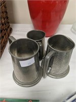 Three pewter tankards