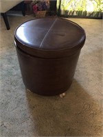 Brown ottoman with compartment inside