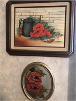 Pair of painted flower pictures on canvas by M