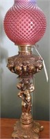 Stunning Brass Cherub font banquet lamp with