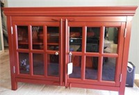 Red lacquer finish two door entertainment/AV