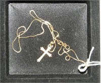 Marked 14kt necklace with marked 10kt gold cross