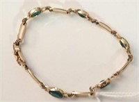 12kt gold filled bracelet with emerald stones