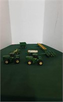 2 john deere toy tractors with 5 attachments