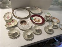 collectable plates, tea cups