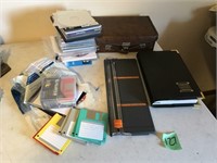 computer disks, paper cutter, dictionary, more