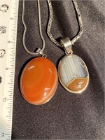 Two polished Agate pendants on sterling silver
