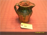 Ceramic green pitcher