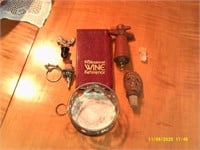 Corkscrew, corks, and wine holder