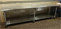 stainless steel prep table on casters 
10'L x