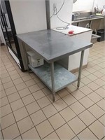 stainless steel prep table
4'W x 30"D x 34.5"T